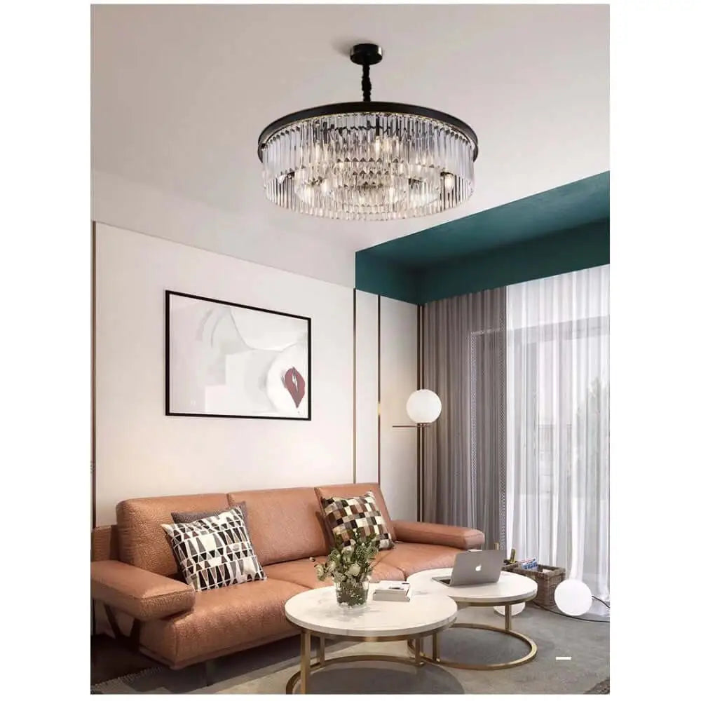 Modern black K9 crystal chandelier pendant ceiling light in elegant living room with brown couch and stylish decor.